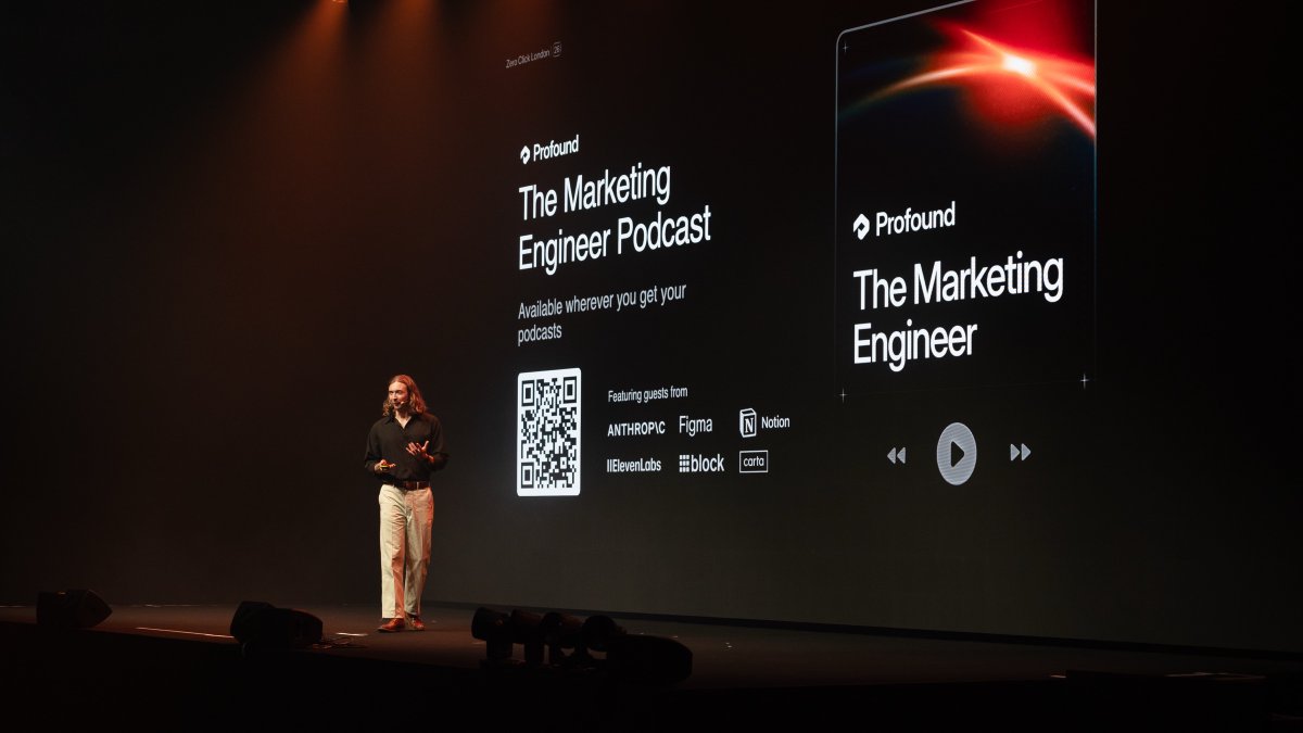 Nick Lafferty introducing The Marketing Engineer Podcast on the big screen at Zero Click London.