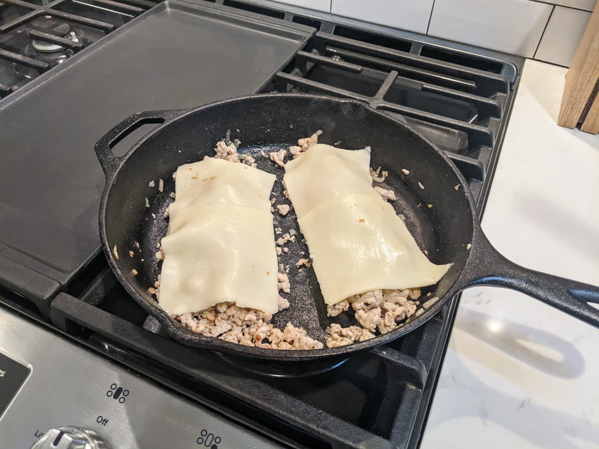 Chicken With Cheese in Skillet
